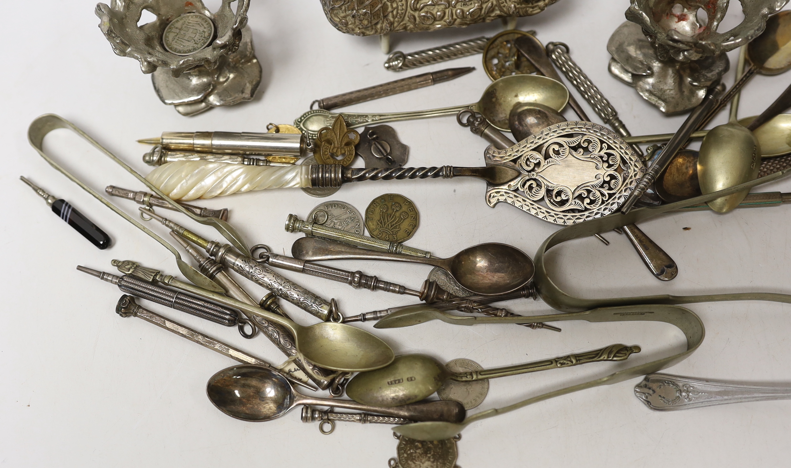 An Edwardian silver mounted travelling watch case, Birmingham, 1903, 11.4cm, and other items including plated flatware, coins and a group of propelling pencils including Sampson Mordan & Co, etc.